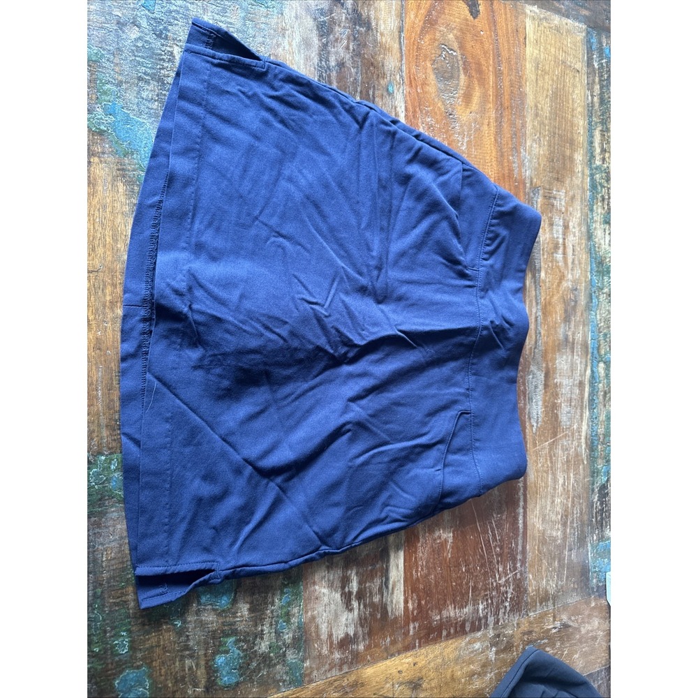 Women Lady Hagen" navy blue SKORT with side pleats Size Sm. Reg. $65.00